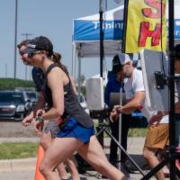 Racers keeping their times as they finish.